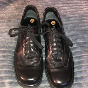 Men’s Salvatore Ferragamo leather dress shoes.